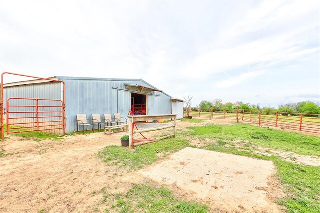 19206 Coker Rd, Shawnee, OK 74801 - view of yard with a rural view, an outbuilding, and an exterior structure