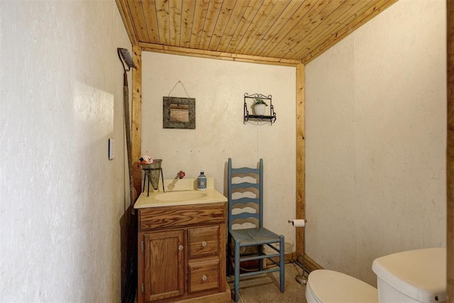 19206 Coker Rd, Shawnee, OK 74801 - bathroom with vanity, toilet, and wood ceiling
