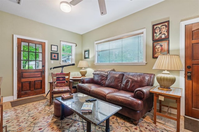 living room with a ceiling fan