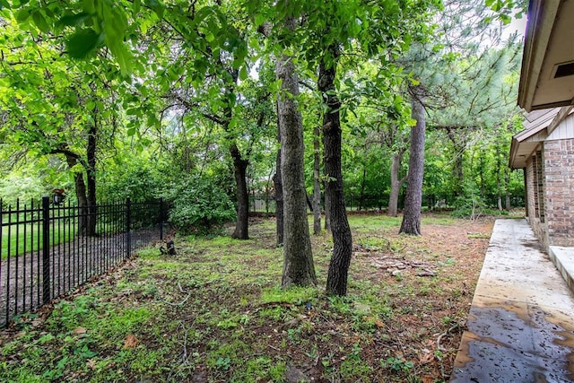 view of yard with fence