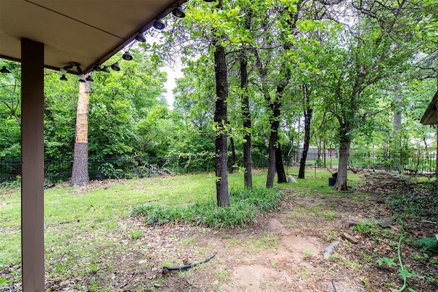view of yard featuring fence