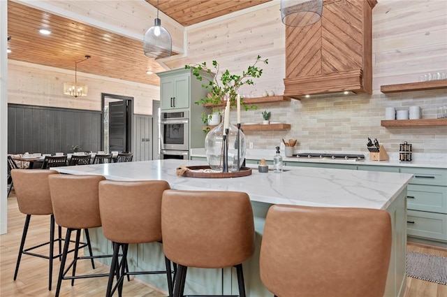 kitchen featuring stainless steel appliances, open shelves, wooden ceiling, and light wood-type flooring