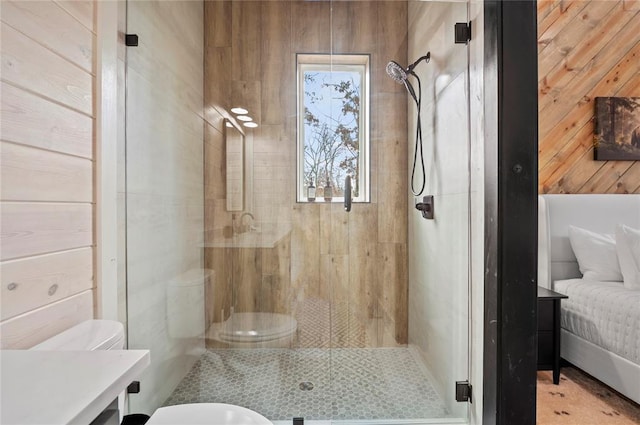 full bath featuring vanity, toilet, and a stall shower