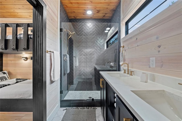 full bath featuring a shower stall and a sink