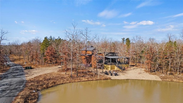 exterior space with a forest view