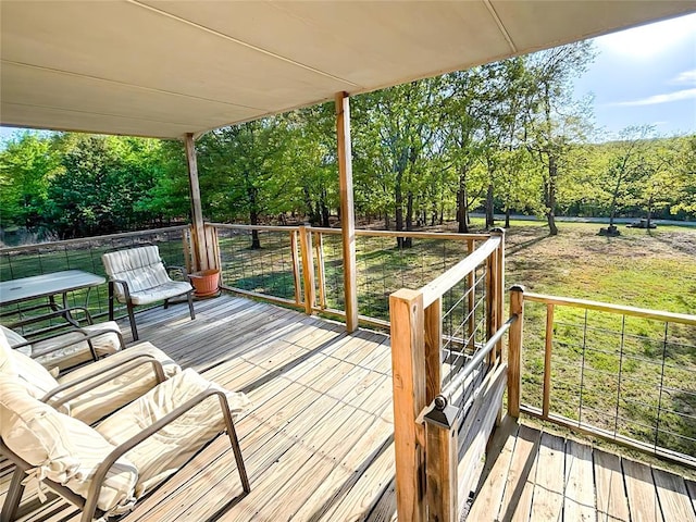 deck featuring a yard