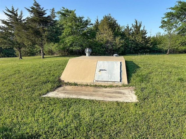 entry to storm shelter with a lawn