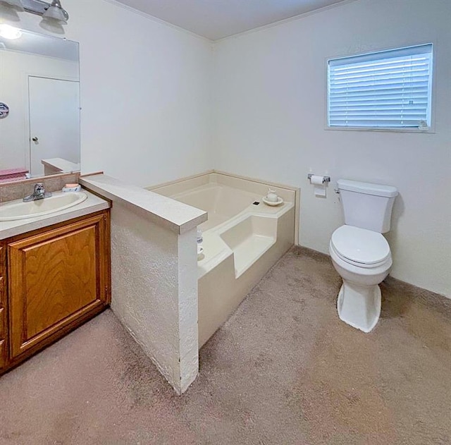 full bathroom featuring a garden tub, vanity, carpet floors, and toilet