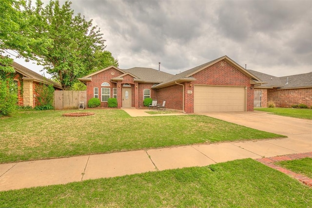 716 SW 149th Pl, Oklahoma City, OK 73170 - single story home with concrete driveway, a front lawn, fence, a garage, and brick siding