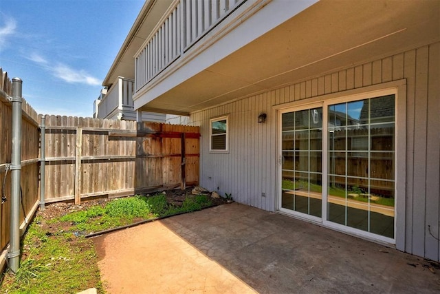 view of patio / terrace featuring fence