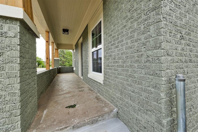 1608 NE 21st St, Oklahoma City, OK 73111 - view of home's exterior with brick siding and a porch