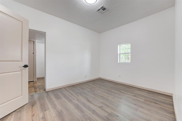1608 NE 21st St, Oklahoma City, OK 73111 - empty room with baseboards, visible vents, and light wood finished floors