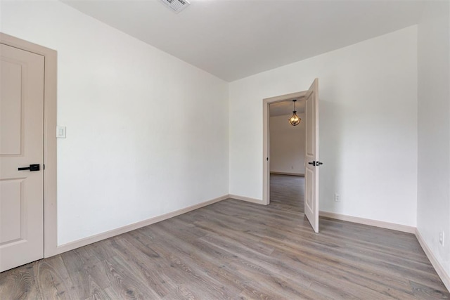 1608 NE 21st St, Oklahoma City, OK 73111 - spare room with light wood finished floors, baseboards, and visible vents