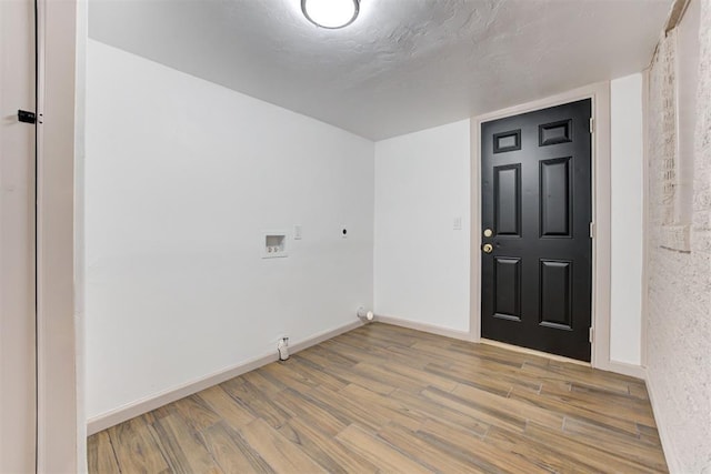 1608 NE 21st St, Oklahoma City, OK 73111 - entrance foyer featuring baseboards and wood finished floors