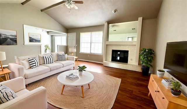 2900 Pheasant Run, Edmond, OK 73012 - living room with wood finished floors, ceiling fan, a fireplace, and baseboards
