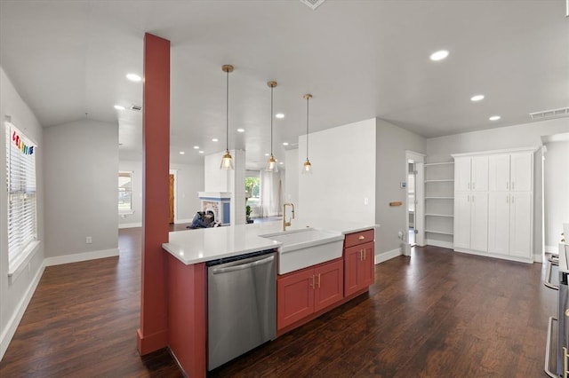 kitchen featuring dark wood-style floors, a sink, visible vents, dishwasher, and open floor plan