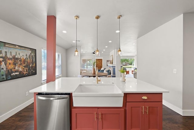 2541 NW 12th St, Oklahoma City, OK 73107 - kitchen featuring stainless steel dishwasher, open floor plan, baseboards, a sink, and recessed lighting
