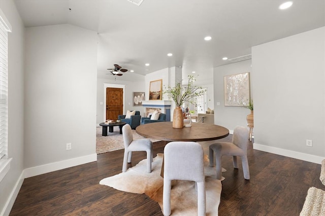 2541 NW 12th St, Oklahoma City, OK 73107 - dining space featuring ceiling fan, recessed lighting, baseboards, a brick fireplace, and wood finished floors