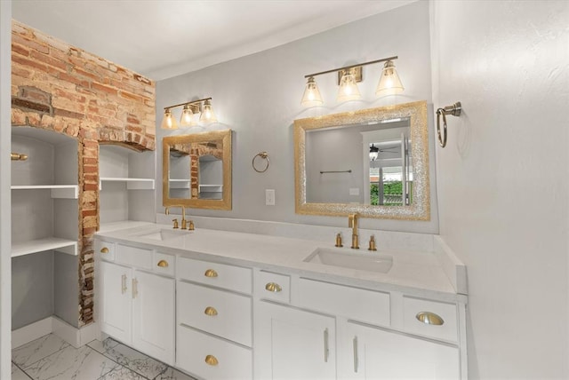 2541 NW 12th St, Oklahoma City, OK 73107 - full bathroom with double vanity and marble finish floors