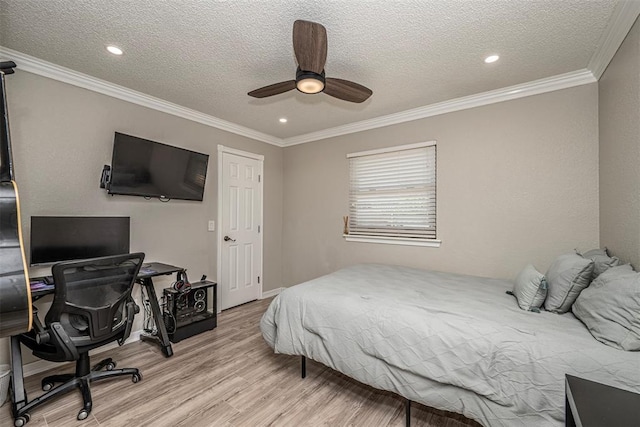 bedroom featuring recessed lighting, light wood-type flooring, a textured ceiling, and crown molding
