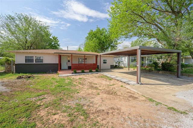 3210 SE 16th St, Oklahoma City, OK 73115 - view of front of house featuring concrete driveway