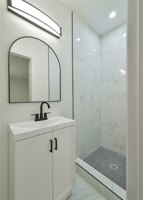 3210 SE 16th St, Oklahoma City, OK 73115 - full bath featuring marble finish flooring, a stall shower, vanity, and recessed lighting