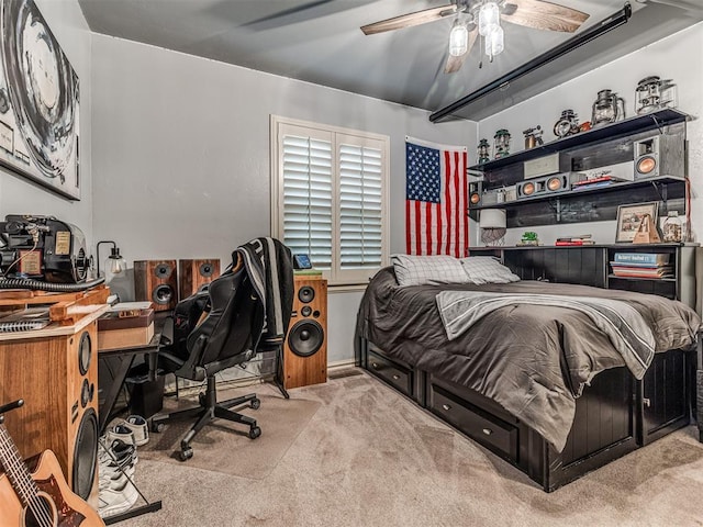 carpeted bedroom featuring a ceiling fan