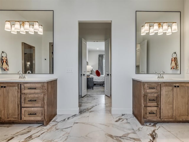 9401 Autumn Park Ln, Oklahoma City, OK 73151 - ensuite bathroom with baseboards, marble finish floor, and two vanities