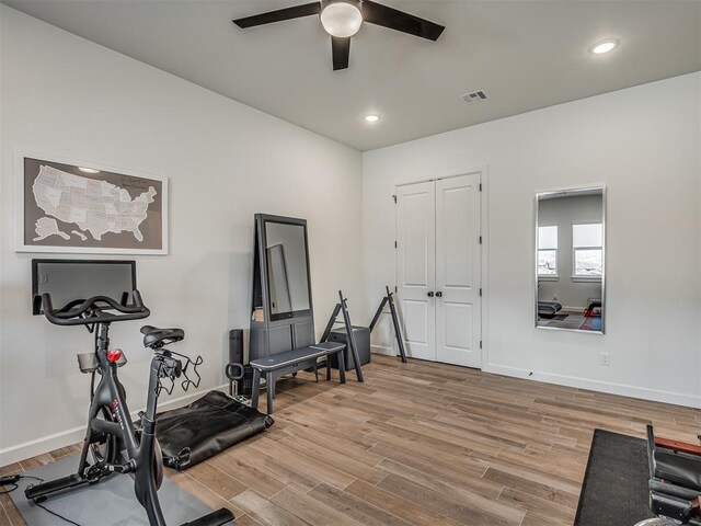 9401 Autumn Park Ln, Oklahoma City, OK 73151 - workout area featuring visible vents, a ceiling fan, baseboards, and wood finished floors