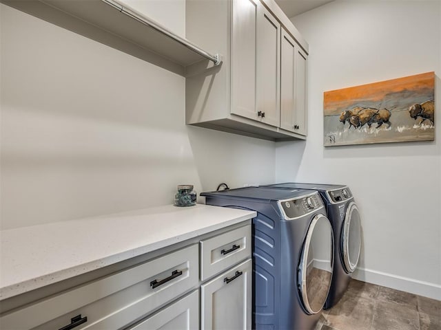 9401 Autumn Park Ln, Oklahoma City, OK 73151 - laundry room featuring cabinet space, baseboards, and washing machine and clothes dryer