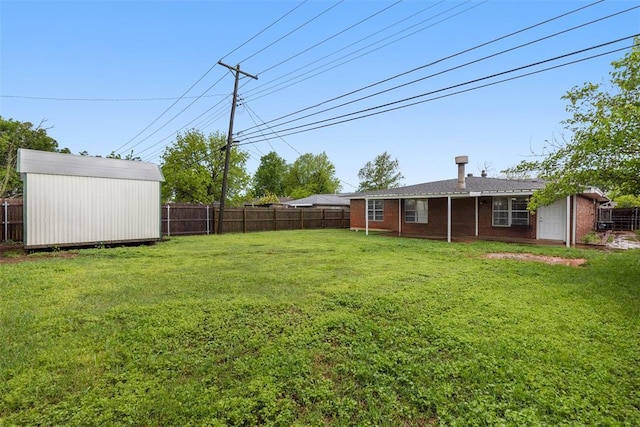 1312 N Nail Pkwy, Moore, OK 73160 - view of yard with a shed and an outdoor structure