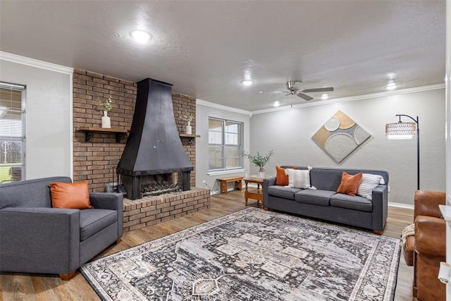 1312 N Nail Pkwy, Moore, OK 73160 - living area with wood finished floors, ceiling fan, crown molding, recessed lighting, and baseboards
