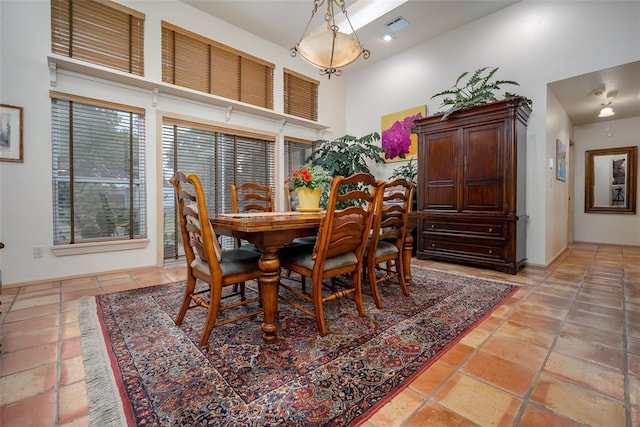 dining space featuring visible vents