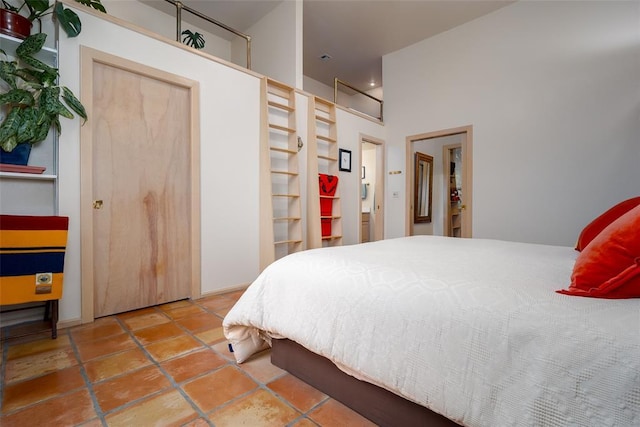 bedroom featuring tile patterned floors
