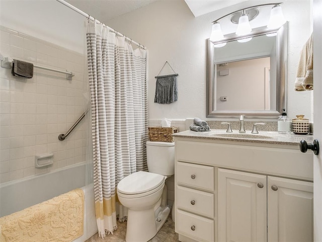 bathroom featuring vanity, shower / bath combo, and toilet