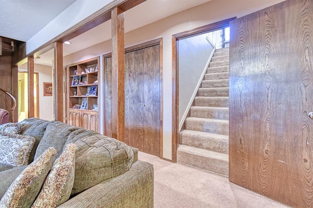 living area with stairway, carpet flooring, and recessed lighting