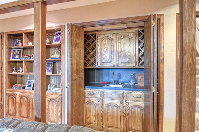 bar with a sink and wet bar