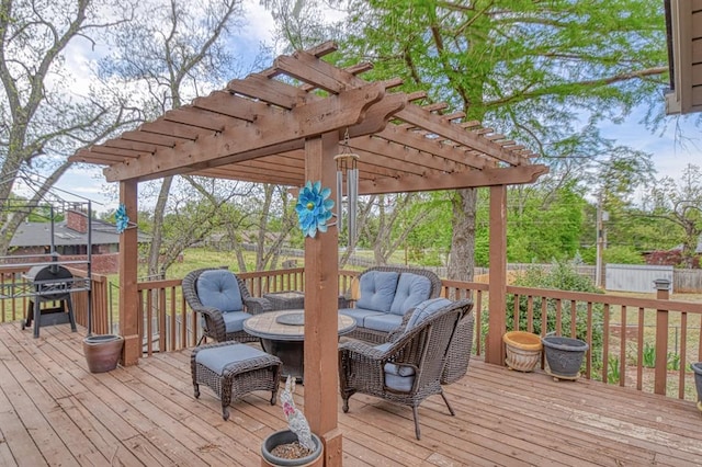 wooden terrace with fence, a pergola, area for grilling, and outdoor lounge area