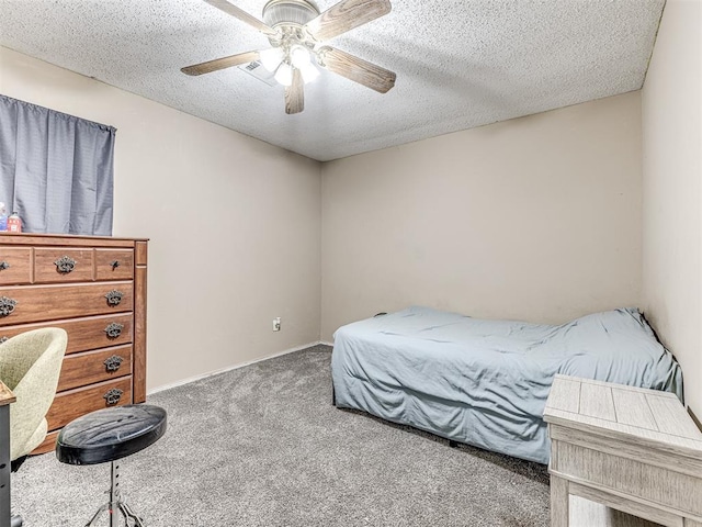 bedroom with carpet floors, a textured ceiling, and ceiling fan