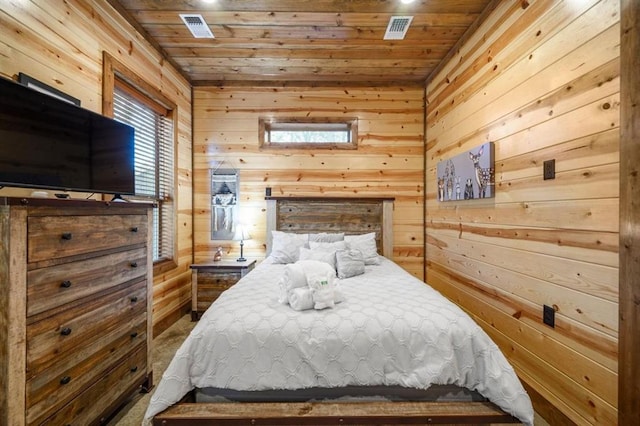 312 Sugar Pine Loop, Broken Bow, OK 74728 - bedroom featuring wood ceiling, visible vents, and wood walls