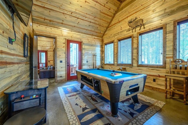 312 Sugar Pine Loop, Broken Bow, OK 74728 - game room with wooden walls, billiards, concrete flooring, and a wood stove