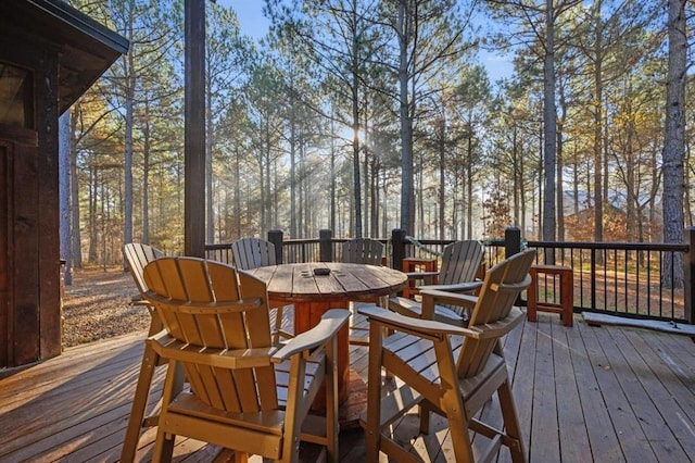 312 Sugar Pine Loop, Broken Bow, OK 74728 - wooden deck with outdoor dining area