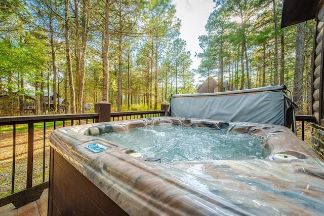 312 Sugar Pine Loop, Broken Bow, OK 74728 - wooden deck with a hot tub