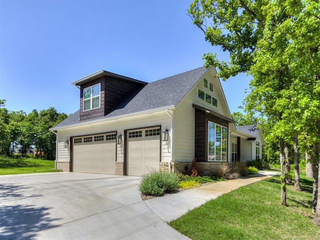 8241 Red Feather, Arcadia, OK 73007 - view of home's exterior with a lawn, driveway, roof with shingles, and a garage