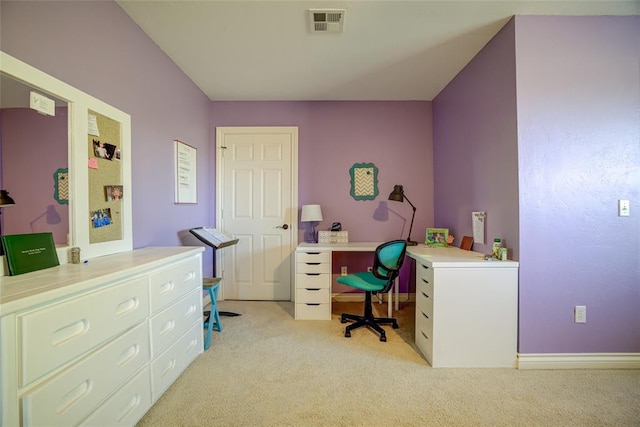 office space with light carpet, baseboards, and visible vents