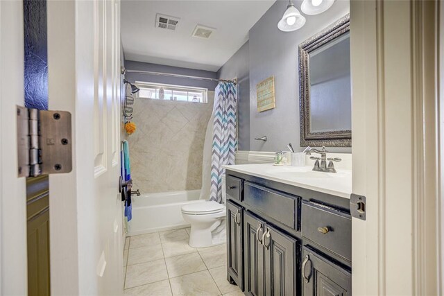 full bathroom featuring tile patterned floors, visible vents, vanity, and toilet
