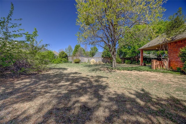 view of yard featuring fence