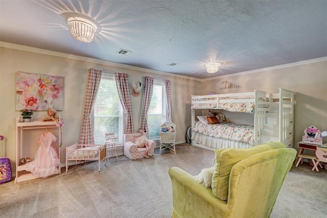 carpeted bedroom with crown molding, baseboards, and visible vents