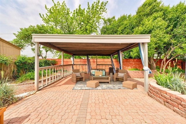 view of patio / terrace featuring outdoor lounge area and a fenced backyard