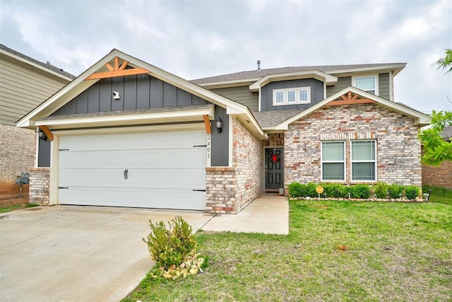 craftsman-style house with a shingled roof, a front lawn, a garage, board and batten siding, and driveway